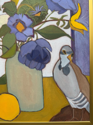 A framed still life painting featuring blue-purple flowers in a pale green vase, a gray bird with brown wings, and yellow accents on a white and mustard background.